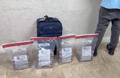 Canadiense llevaba 14 paquetes de presunta cocaína en una maleta, según la DNCD
